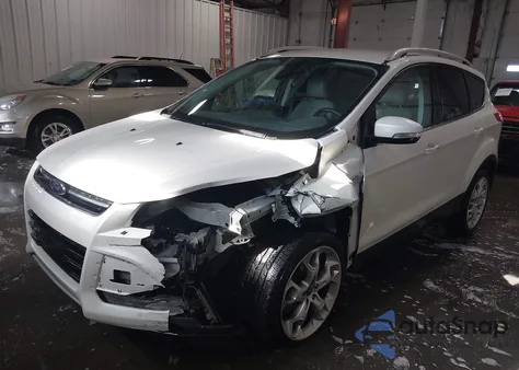 2014 Ford Escape Titanium z USA, uszkodzony, nr VIN 1FMCU9J97EUA70335